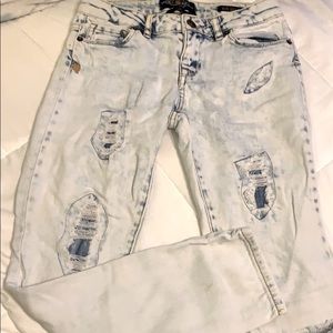 Girls Lucky Brand stonewashed straight leg jeans.